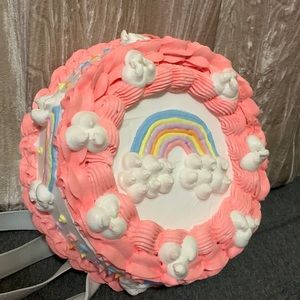 Angel Couturier Cake Back pack. Never used. New with tags. Originally paid $200.